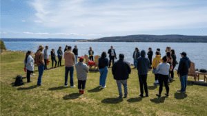 group of indigenous youth gathering outside